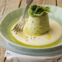 Sformatino di cardoni selvatici su fonduta di pecorino fresco