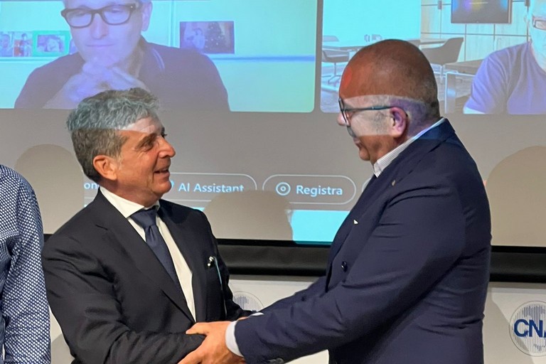 da sx il presidente uscente Pellegrino ed il neo-presidente AIFO, Amoroso